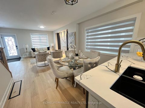 Photo 6 at 12 Thyra Avenue, Crescent Town, Toronto