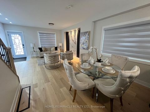 Photo 7 at 12 Thyra Avenue, Crescent Town, Toronto