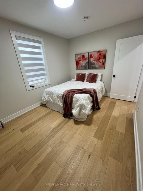 Photo 15 at 12 Thyra Avenue, Crescent Town, Toronto