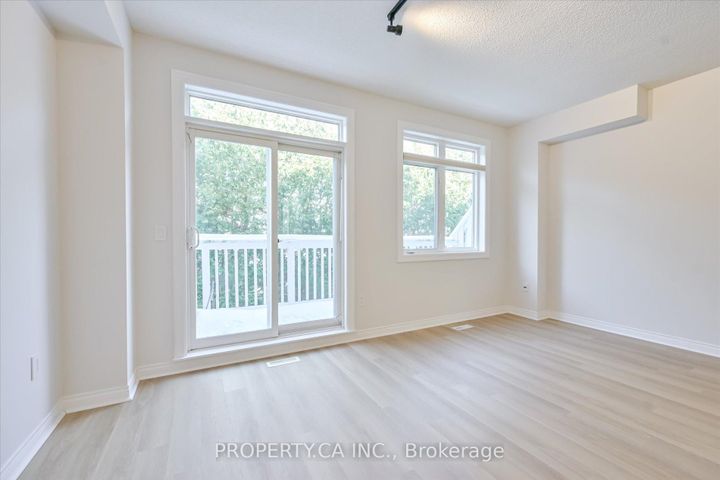 Photo 12 at 46 - 1051 On Bogart Circle, College Manor, Newmarket