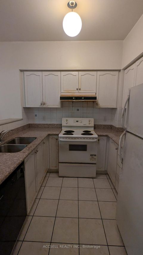 Photo 7 at 13 - 20 St Moritz Way, Unionville, Markham