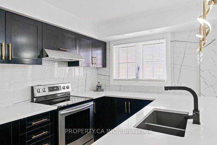 Photo 9 at 113 - 2441 Greenwich Drive, WM Westmount, Oakville