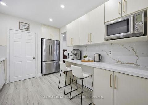 Photo 8 at 21 Radwinter Drive, Beaumonde Heights, Toronto