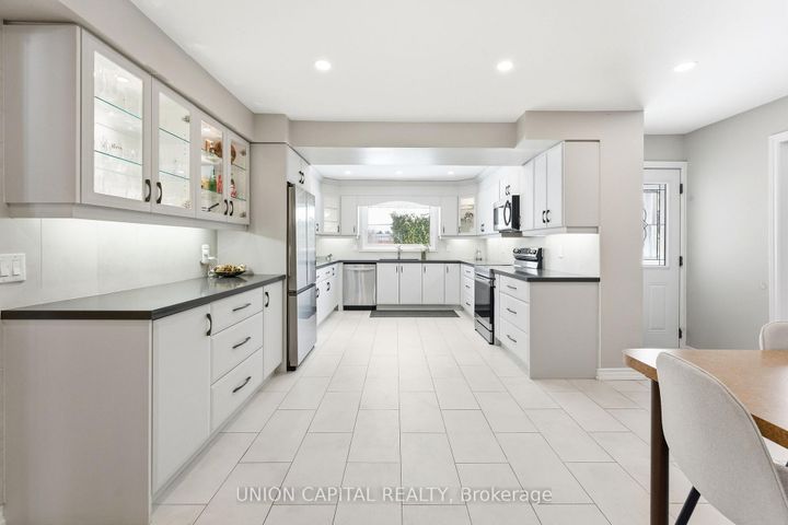 Photo 2 at 53 Stubbswood Square, Malvern West, Toronto