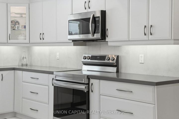 Photo 5 at 53 Stubbswood Square, Malvern West, Toronto