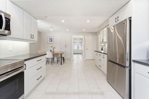 Photo 4 at 53 Stubbswood Square, Malvern West, Toronto