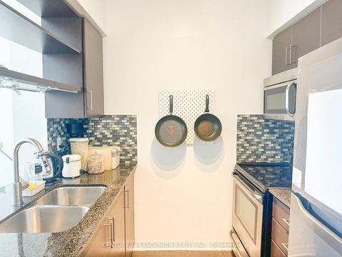 Photo 5 at Ph 7 - 30 Heron's Hill Way, Henry Farm, Toronto