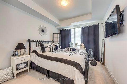Photo 11 at 704 - 840 Queens Plate Drive, Clairville, Toronto