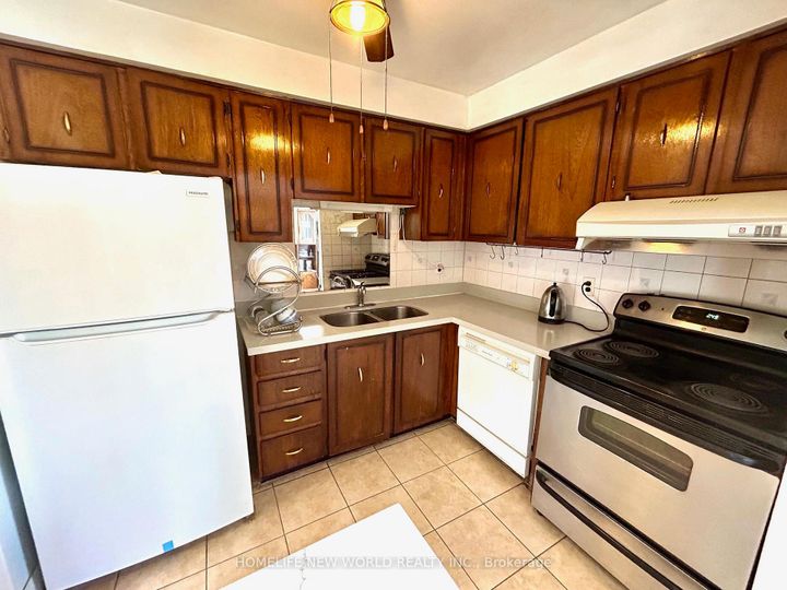 Photo 12 at 29 Jenny Wrenway, Hillcrest Village, Toronto