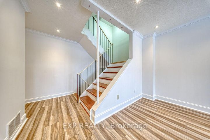 Photo 3 at 16 - 33 Four Winds Drive, York University Heights, Toronto