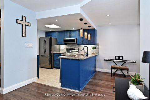 Photo 7 at 910 - 275 Bamburgh Circle, Steeles, Toronto