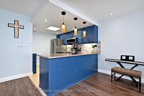 Photo 16 at 910 - 275 Bamburgh Circle, Steeles, Toronto