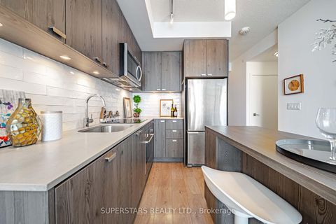 Photo 8 at 2008 - 56 Forest Manor Road, Henry Farm, Toronto