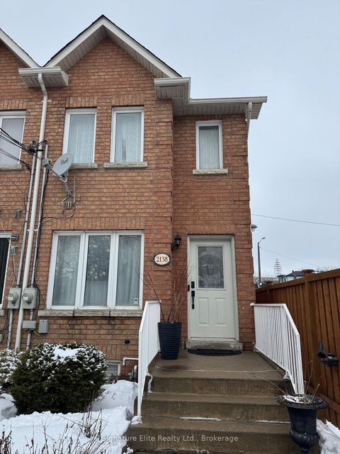 Photo 1 at 2138 Eglinton Avenue W, Belgravia, Toronto