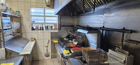 Photo 1 at 1662 Eglinton Avenue W, Belgravia, Toronto