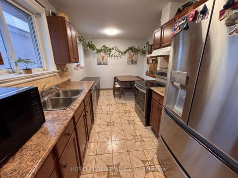 Photo 12 at 77 Newlin Crescent, Jane Heights, Toronto