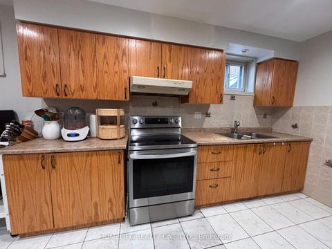 Photo 28 at 77 Newlin Crescent, Jane Heights, Toronto