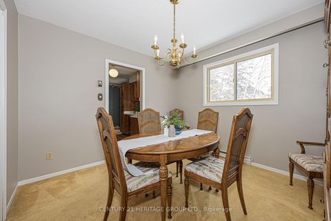 Photo 10 at 62 Fairway Drive, Aurora Highlands, Aurora