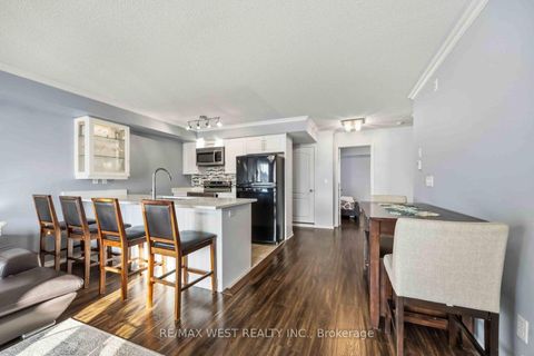 Photo 7 at 6 - 133 Isaac Devins Boulevard, Pelmo Park W5, Toronto