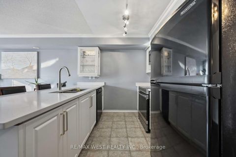 Photo 8 at 6 - 133 Isaac Devins Boulevard, Pelmo Park W5, Toronto