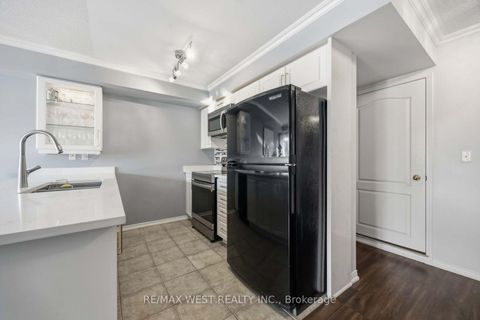 Photo 10 at 6 - 133 Isaac Devins Boulevard, Pelmo Park W5, Toronto