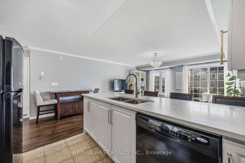 Photo 11 at 6 - 133 Isaac Devins Boulevard, Pelmo Park W5, Toronto