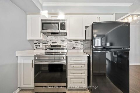 Photo 12 at 6 - 133 Isaac Devins Boulevard, Pelmo Park W5, Toronto