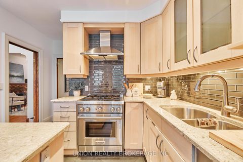 Photo 9 at 345 Kingswood Road, The Beaches, Toronto