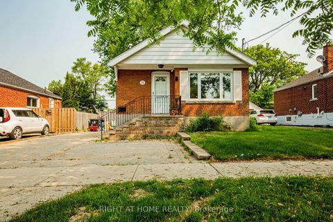 Photo 1 at 32 Florens Avenue, Birchmount, Toronto