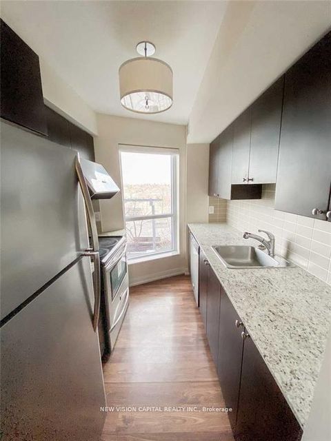 Photo 5 at 508 - 151 Village Green Square, Malvern West, Toronto