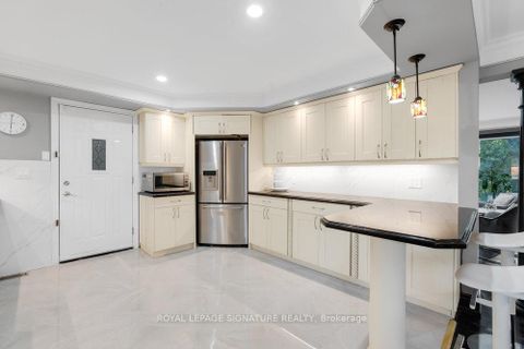 Photo 12 at 23 Burnview Crescent, Woburn, Toronto