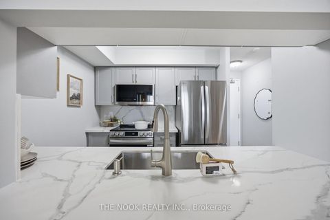 Photo 8 at 332 - 18 Mondeo Drive, Dorset Park, Toronto