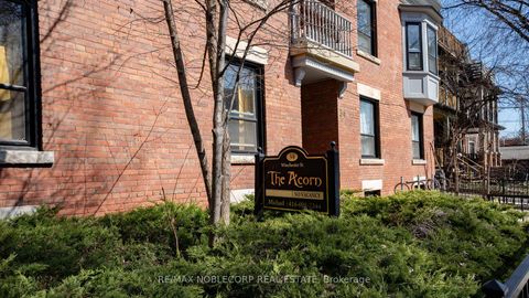 Photo 1 at 34 Winchester Street, South St. James Town, Toronto