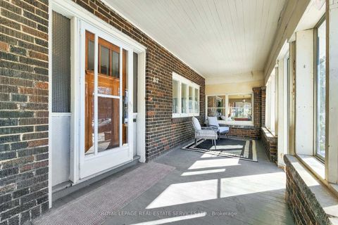 Photo 2 at 317 Runnymede Road, High Park North, Toronto