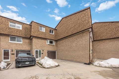 Photo 1 at 40 - 671 Huntingwood Drive, Sullivan, Toronto