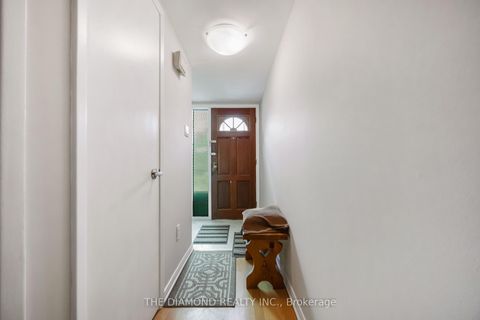 Photo 3 at 40 - 671 Huntingwood Drive, Sullivan, Toronto