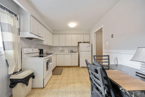 Photo 19 at 40 - 671 Huntingwood Drive, Sullivan, Toronto