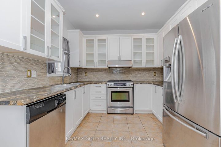 Photo 12 at 64 Mossgrove Crescent, Northwest Sandalwood Parkway, Brampton