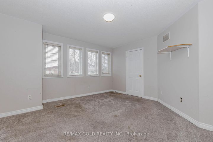 Photo 17 at 64 Mossgrove Crescent, Northwest Sandalwood Parkway, Brampton