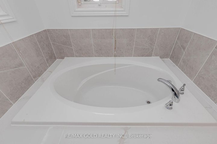 Photo 25 at 64 Mossgrove Crescent, Northwest Sandalwood Parkway, Brampton