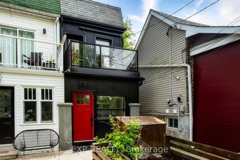 Photo 2 at 819 Craven Road, Coxwell, Toronto