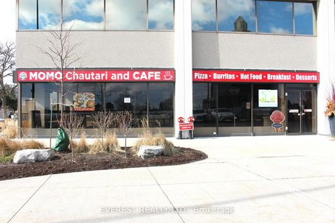 Photo 1 at 100 - 10 Milner Business Court, Malvern, Toronto