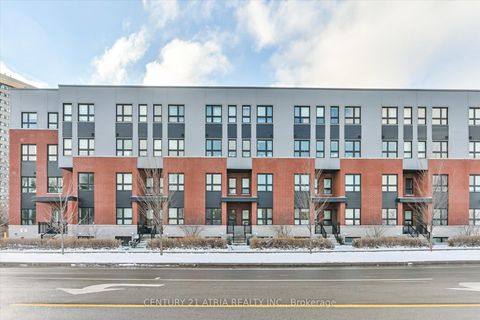 Photo 1 at 111 - 2100 Bridletowne Circle, L'Amoreaux, Toronto