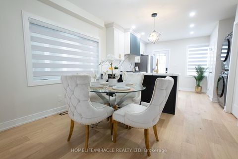 Photo 3 at 12 Thyra Avenue, Crescent Town, Toronto