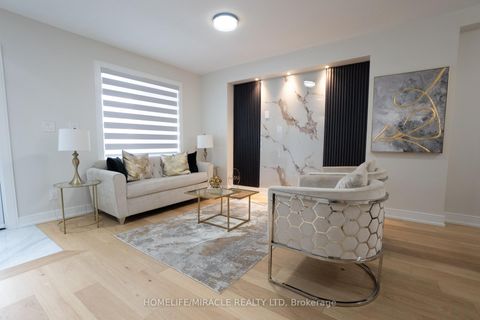 Photo 5 at 12 Thyra Avenue, Crescent Town, Toronto