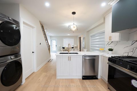 Photo 7 at 12 Thyra Avenue, Crescent Town, Toronto