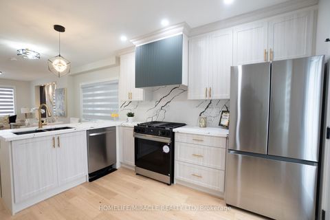 Photo 8 at 12 Thyra Avenue, Crescent Town, Toronto