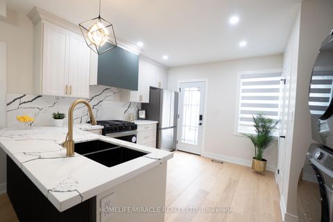 Photo 9 at 12 Thyra Avenue, Crescent Town, Toronto