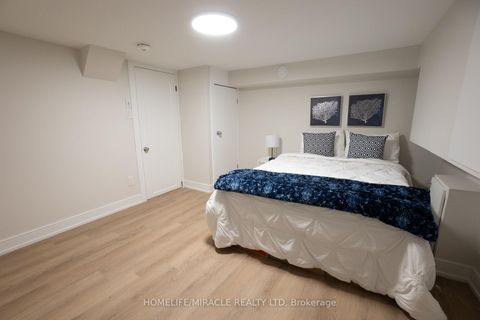 Photo 14 at 12 Thyra Avenue, Crescent Town, Toronto
