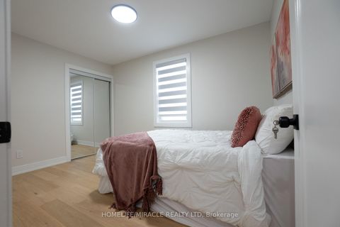 Photo 24 at 12 Thyra Avenue, Crescent Town, Toronto